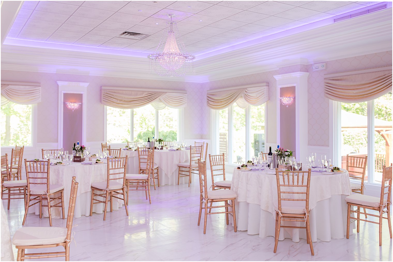 wedding reception at The English Manor with purple uplighting