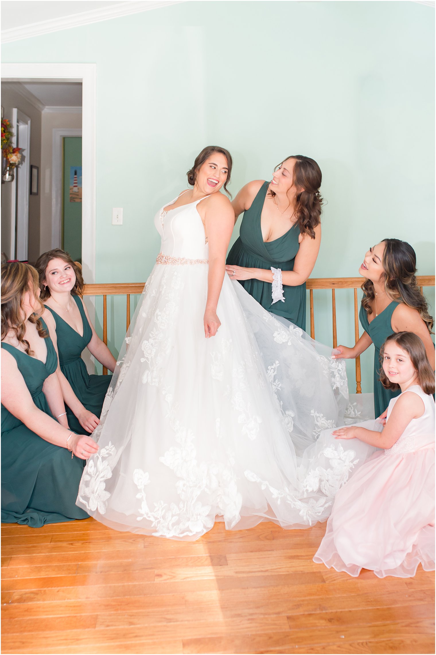 bridesmaids help bride prepare for New Jersey wedding day