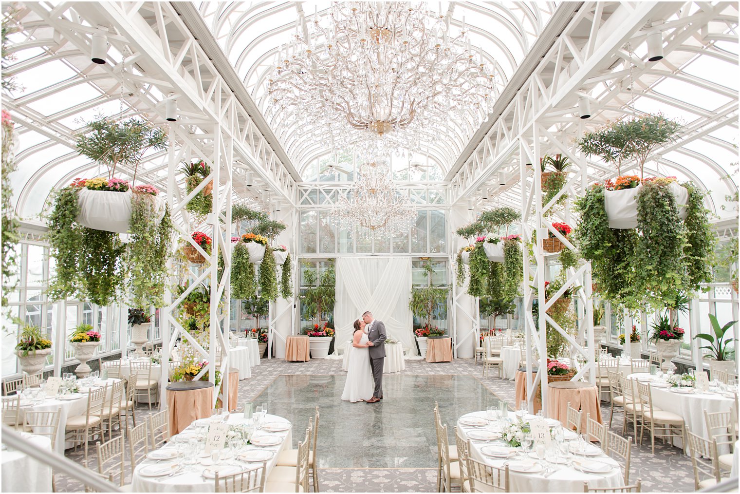 newlyweds dance in reception space at The Madison Hotel