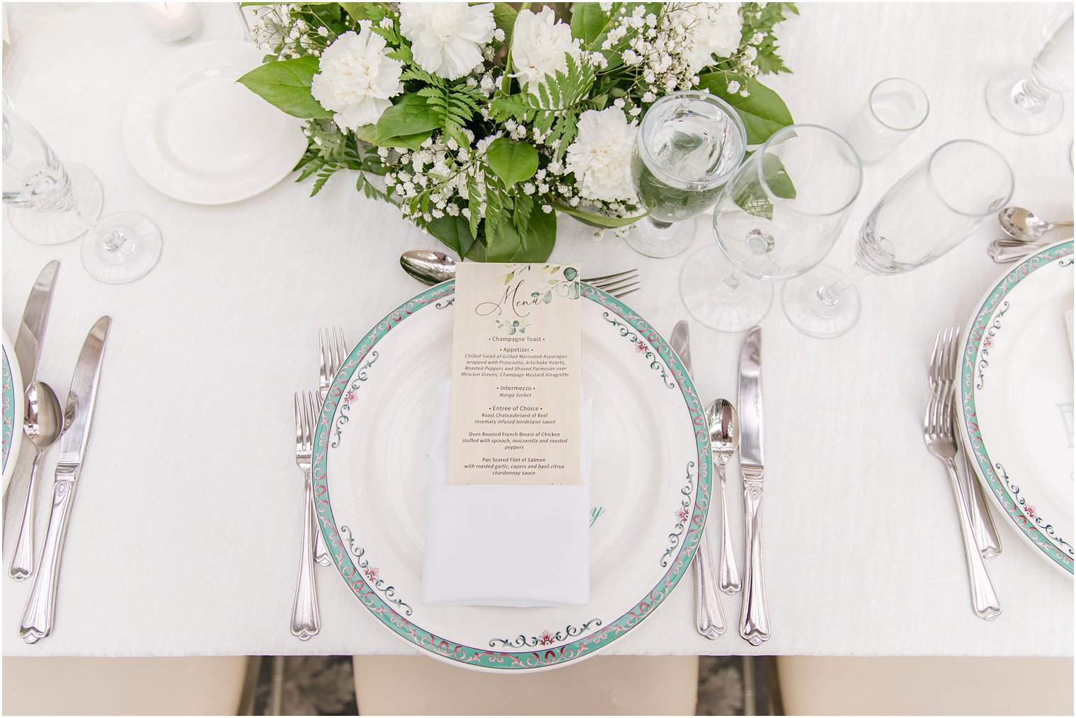 spring wedding reception place settings with vintage plates