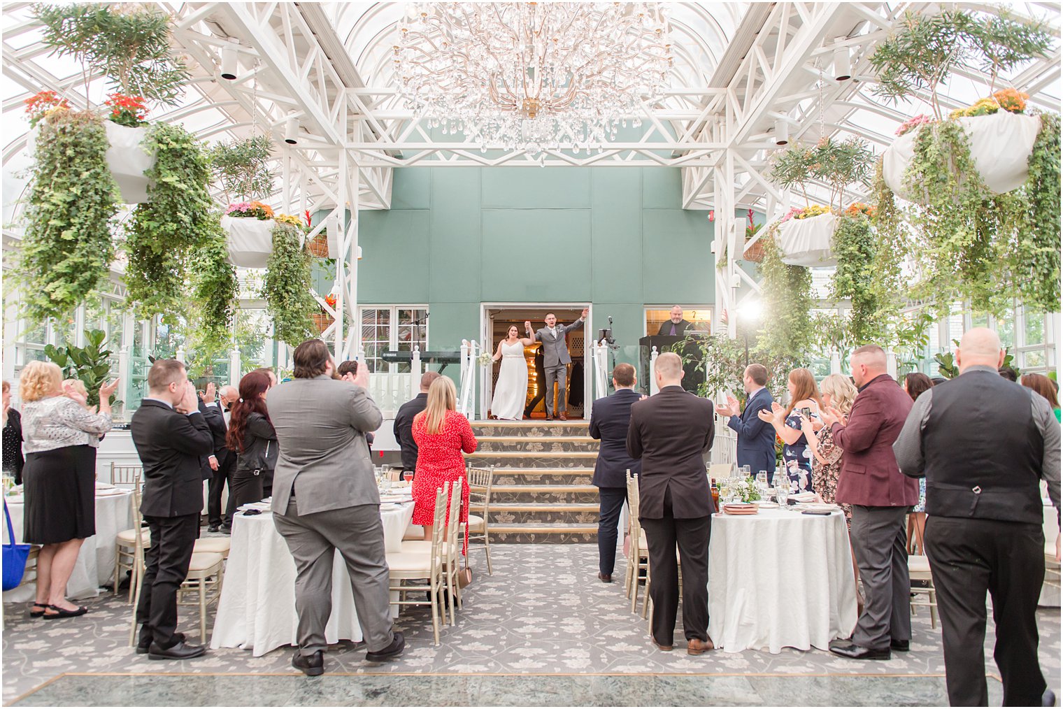 bride and groom cheer entering NJ wedding reception