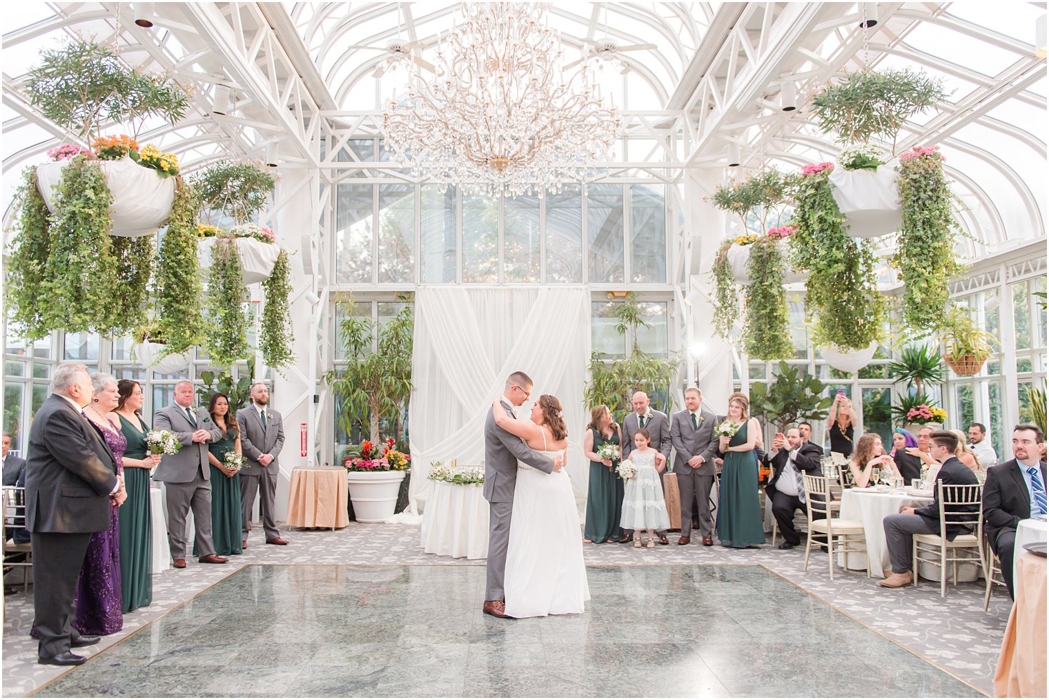 bride and groom dance together during The Madison Hotel wedding