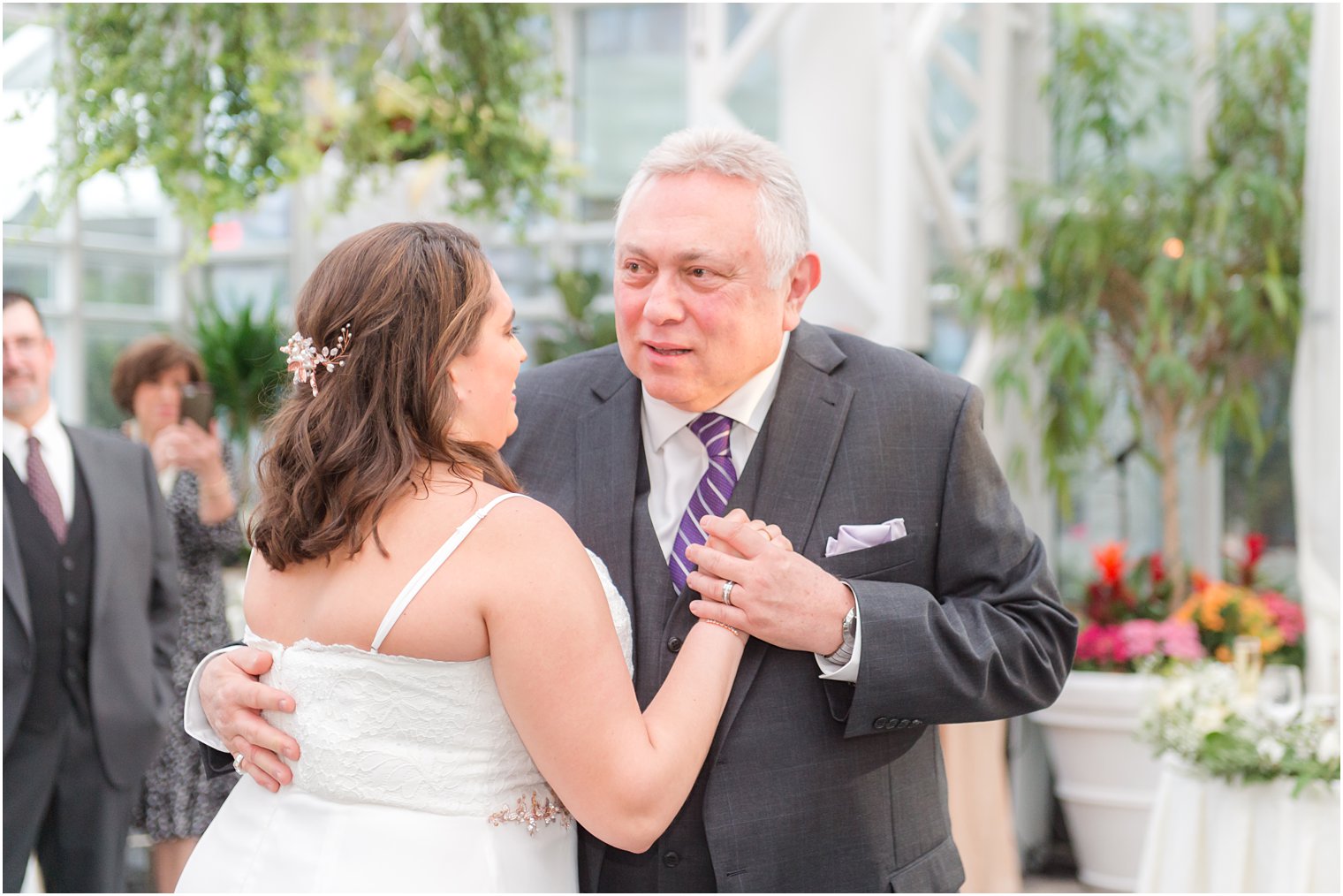 bride and father dance during NJ wedding reception in The Madison Hotel atrium