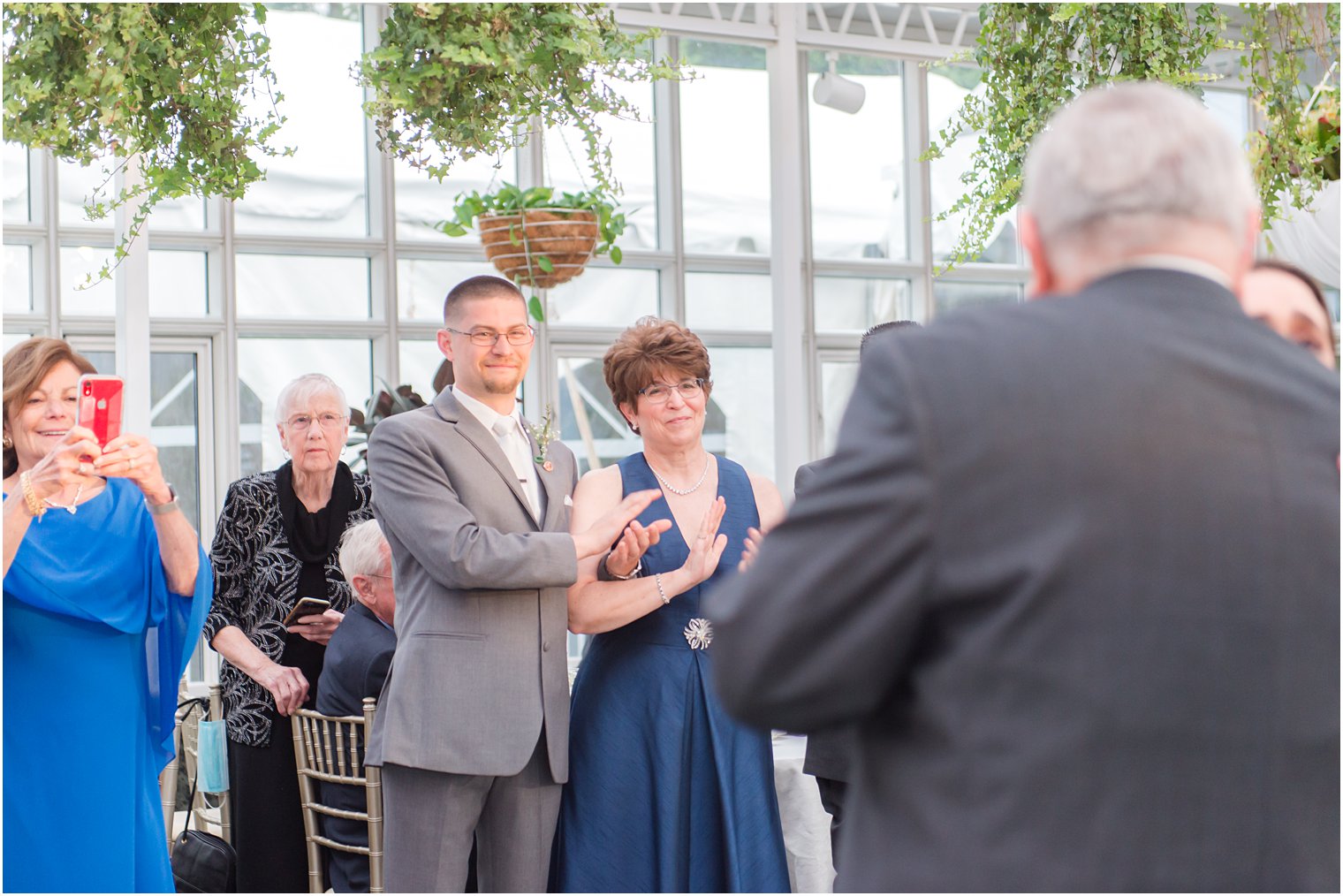 groom and mother clap for bride and father's dance in New Jersey
