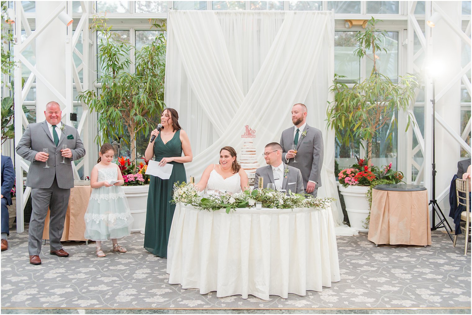 maid of honor reads toast during NJ wedding reception