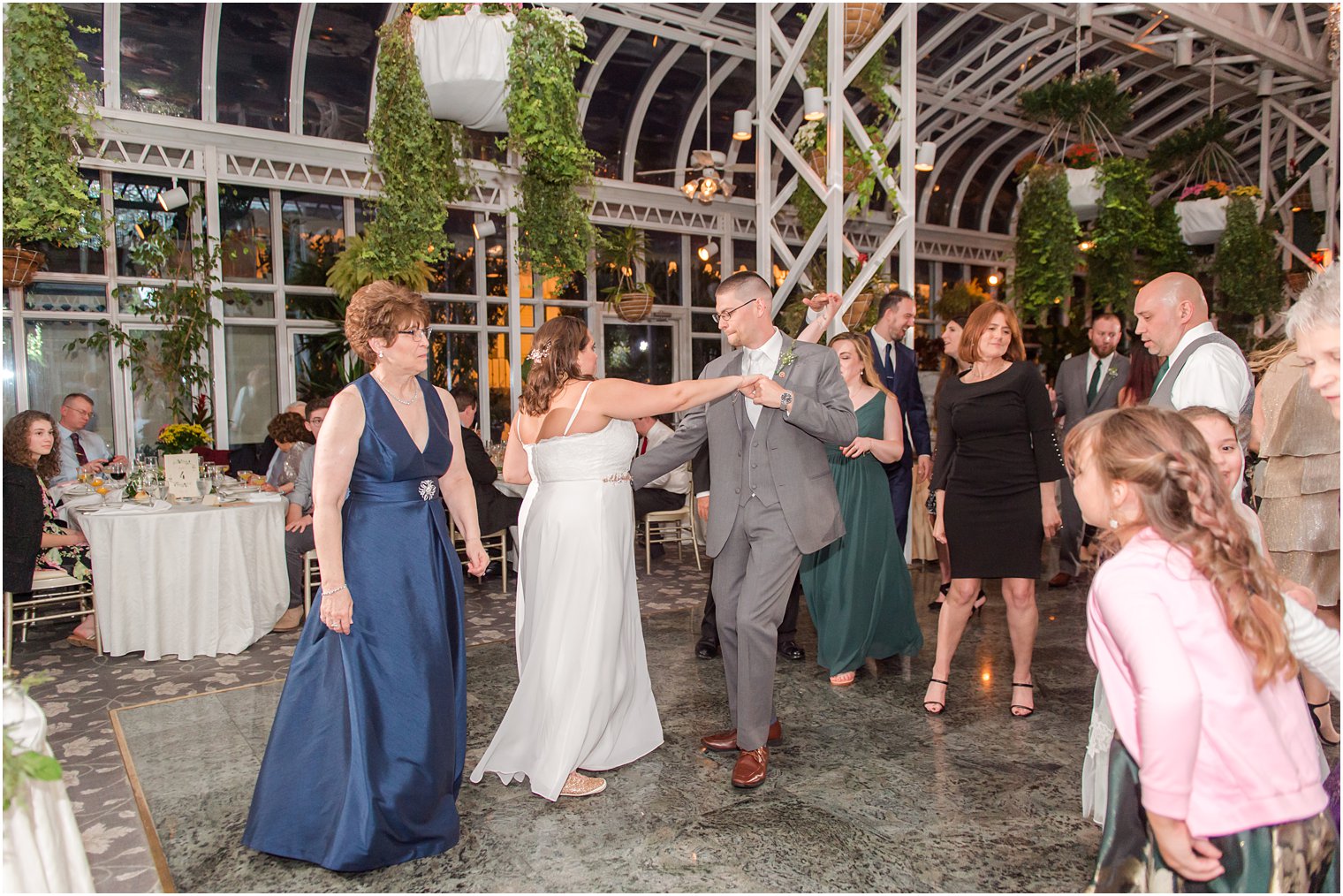 newlyweds dance together during NJ wedding reception at The Madison Hotel