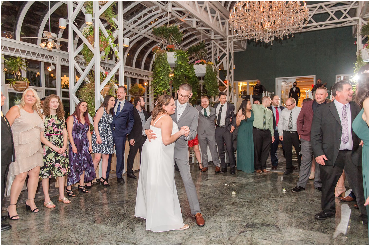 bride and groom dance during The Madison Hotel Wedding reception