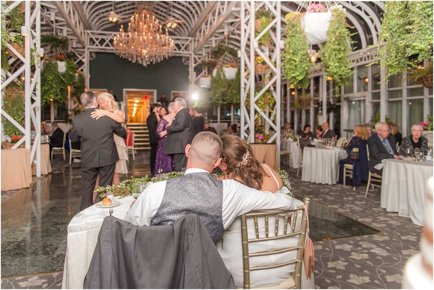 bride and groom watch parents dance during NJ wedding reception