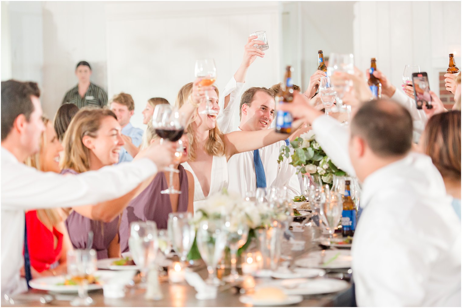 guests toast during wedding reception in New Jersey 