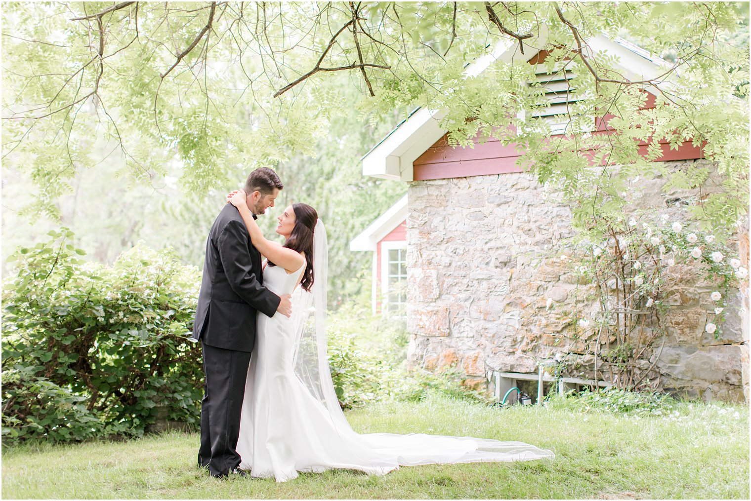 bride and groom posing for photos at Crossed Keys Estate