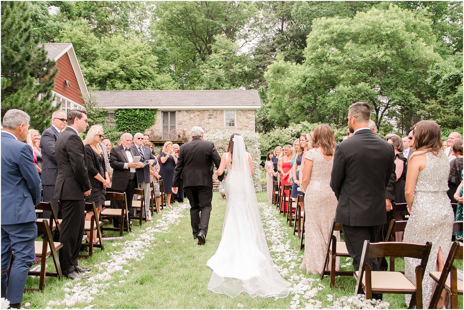 bride's processional during outdoor ceremony