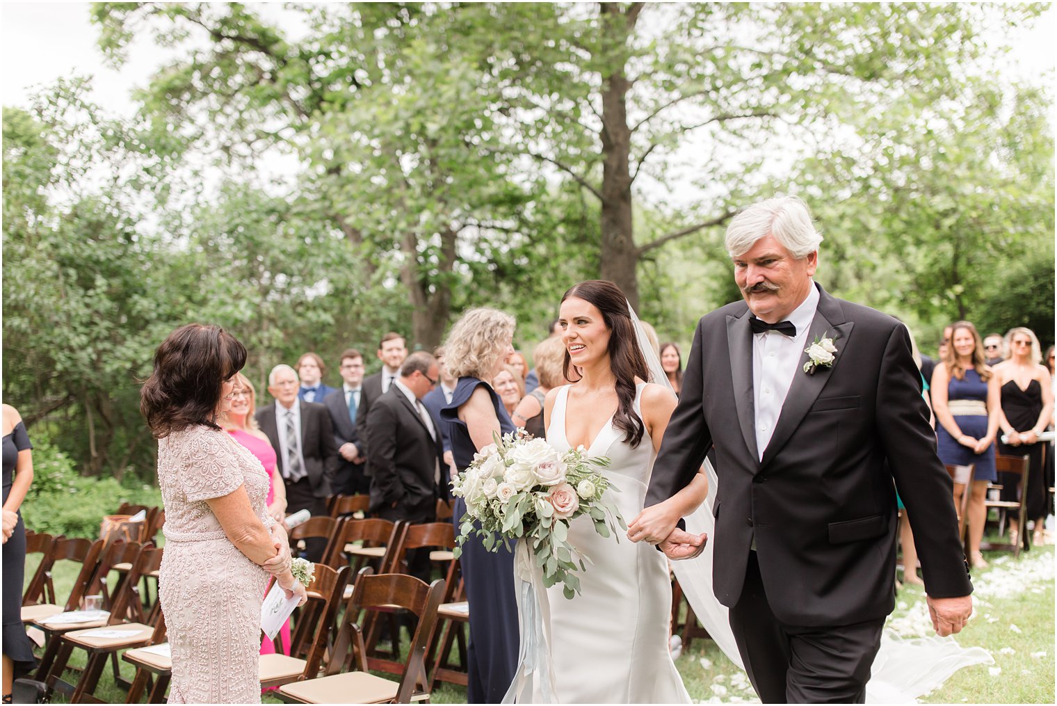 father giving away his daughter during Crossed Keys Estate ceremony