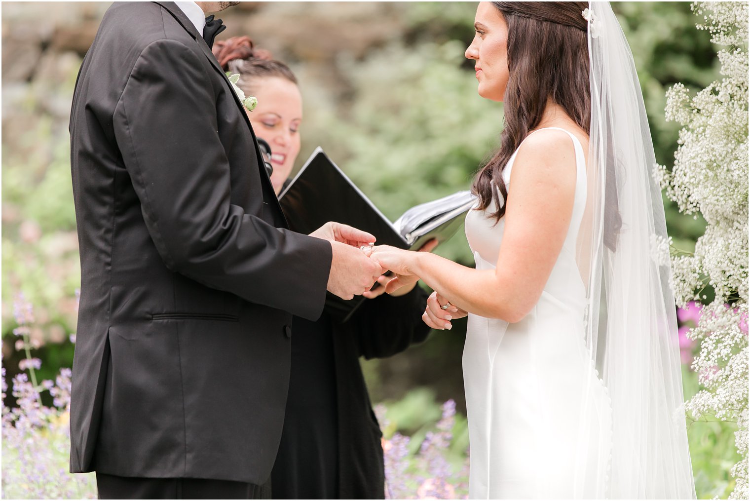 exchange of rings during wedding ceremony