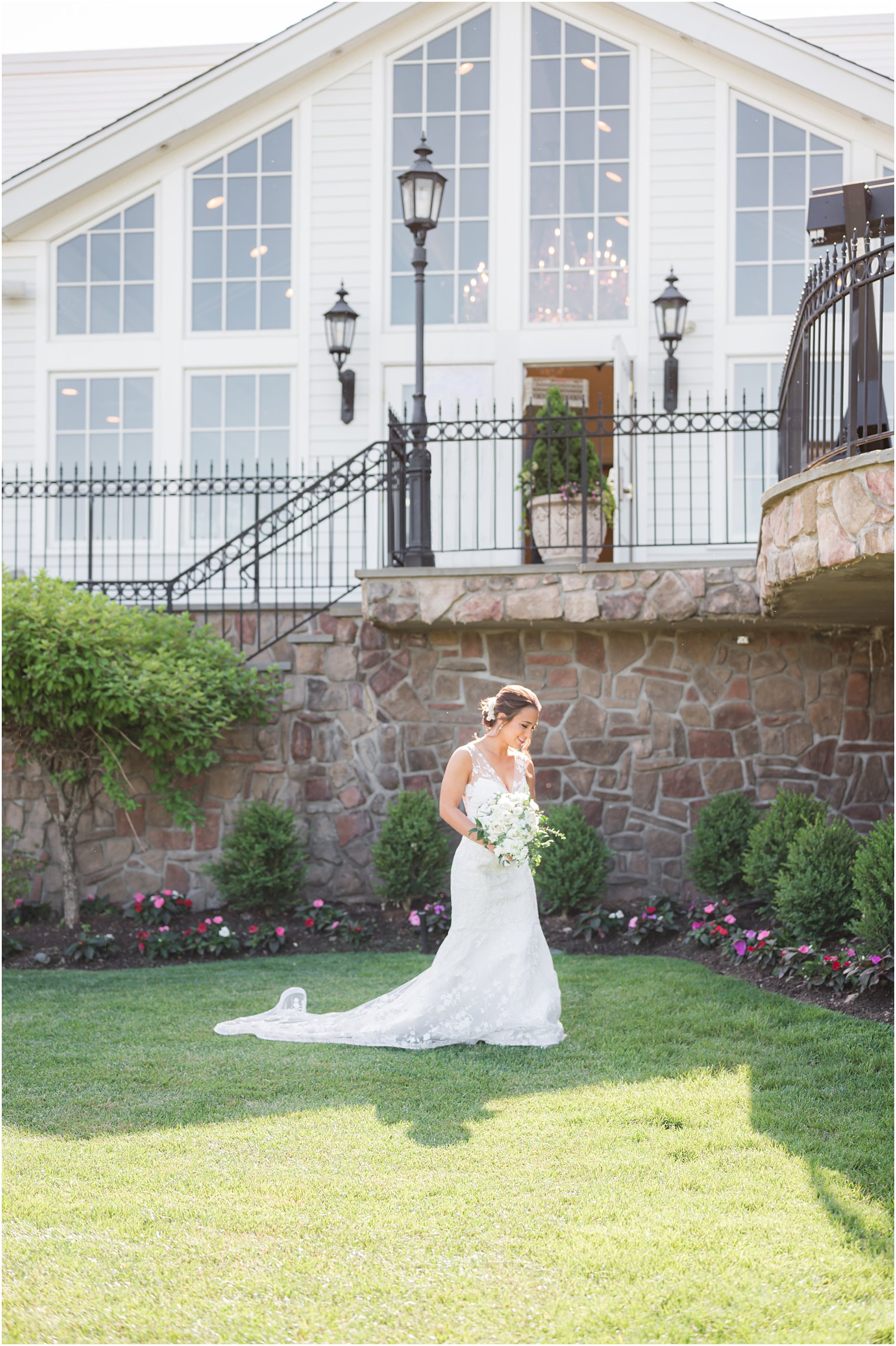 bride walks in front of Park Savoy Estate for first look 