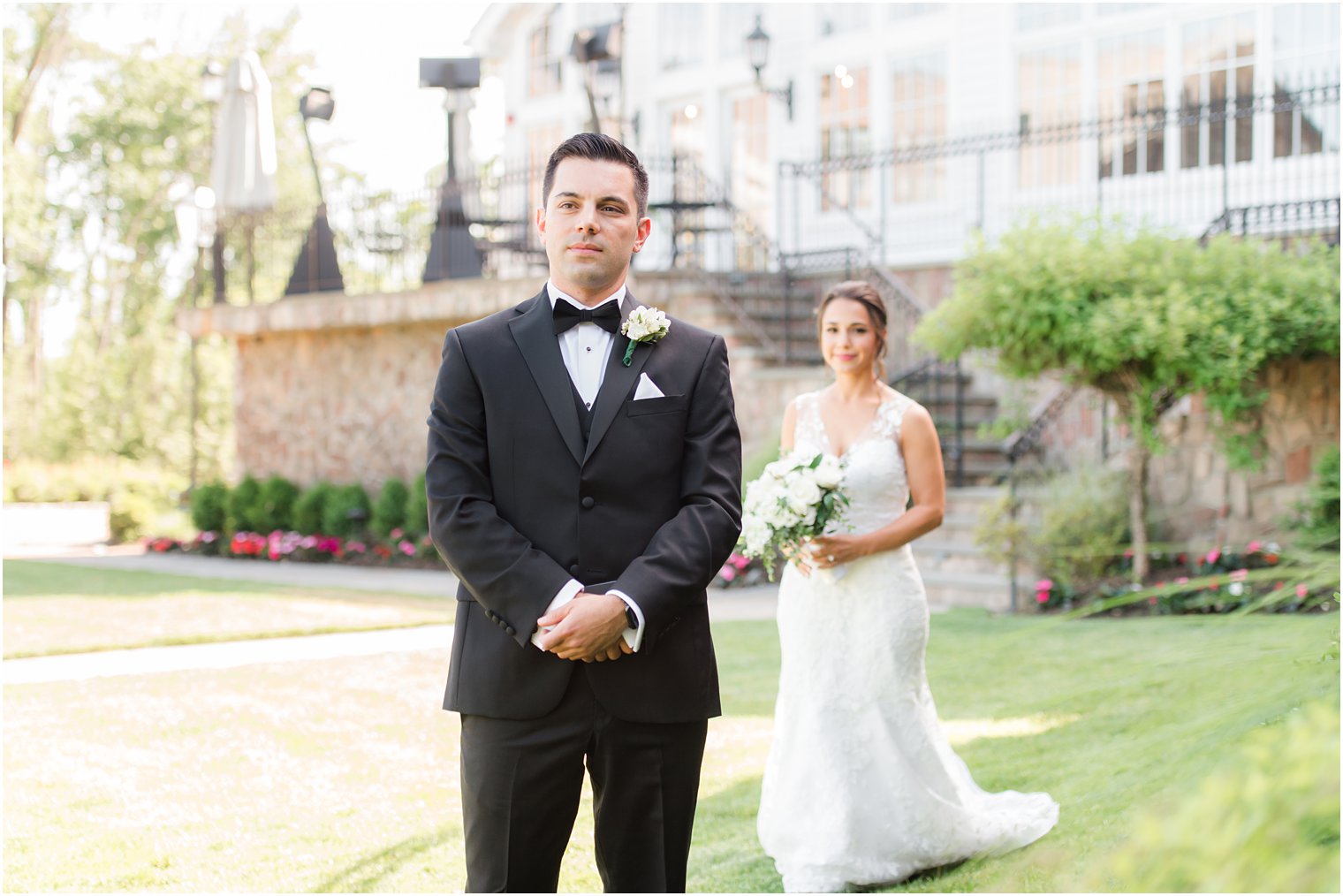 bride walks up behind groom for first look at Park Savoy Estate