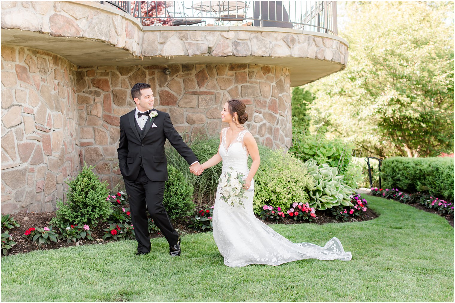 Park Savoy Estate wedding portraits of bride and groom by stone balcony 