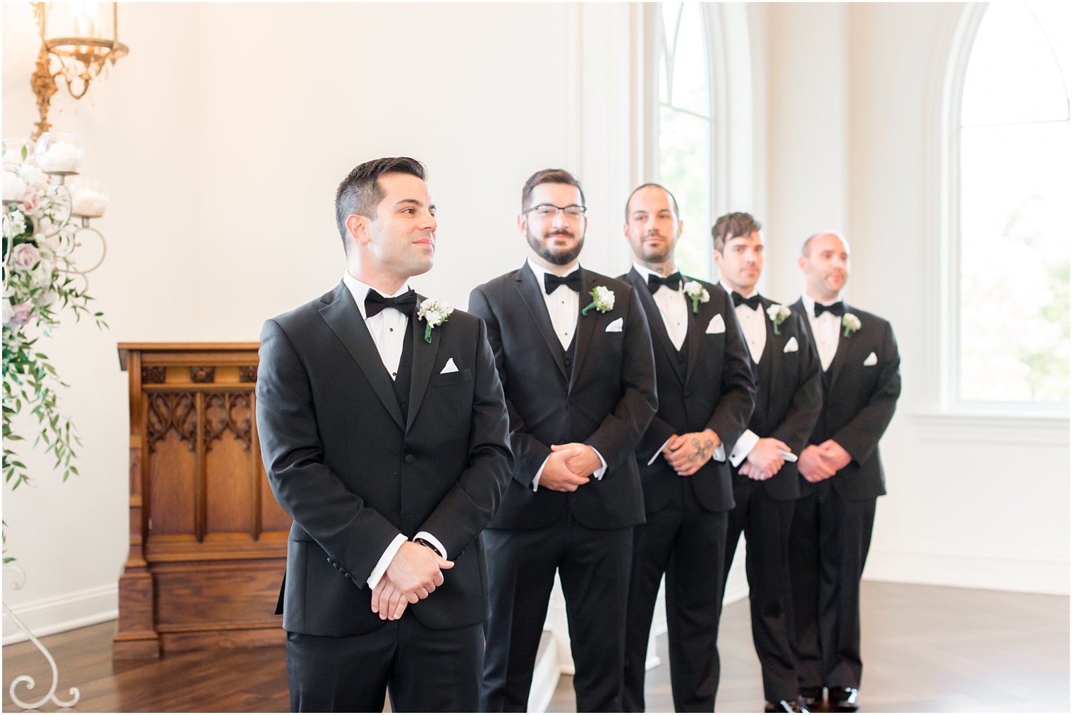 groom watches bride walk down aisle in Park Savoy Estate chapel 