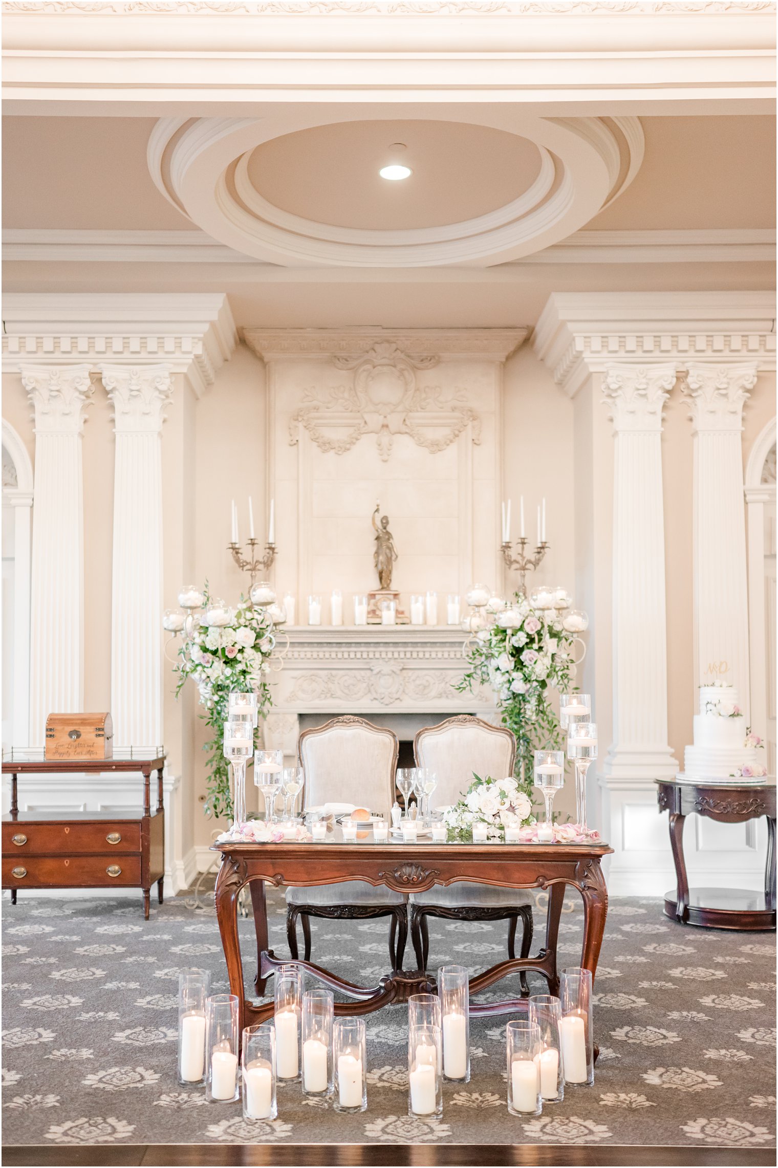 sweetheart table with candles in front for elegant Park Savoy Estate wedding