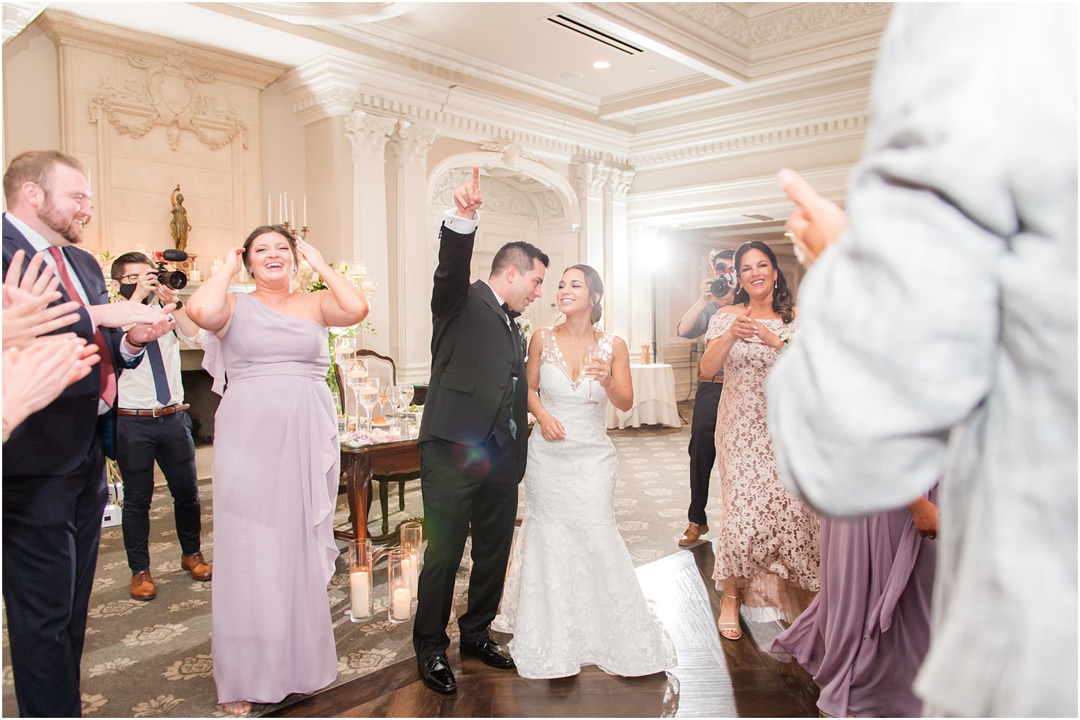 newlyweds dance with guests in ballroom at Park Savoy Estate