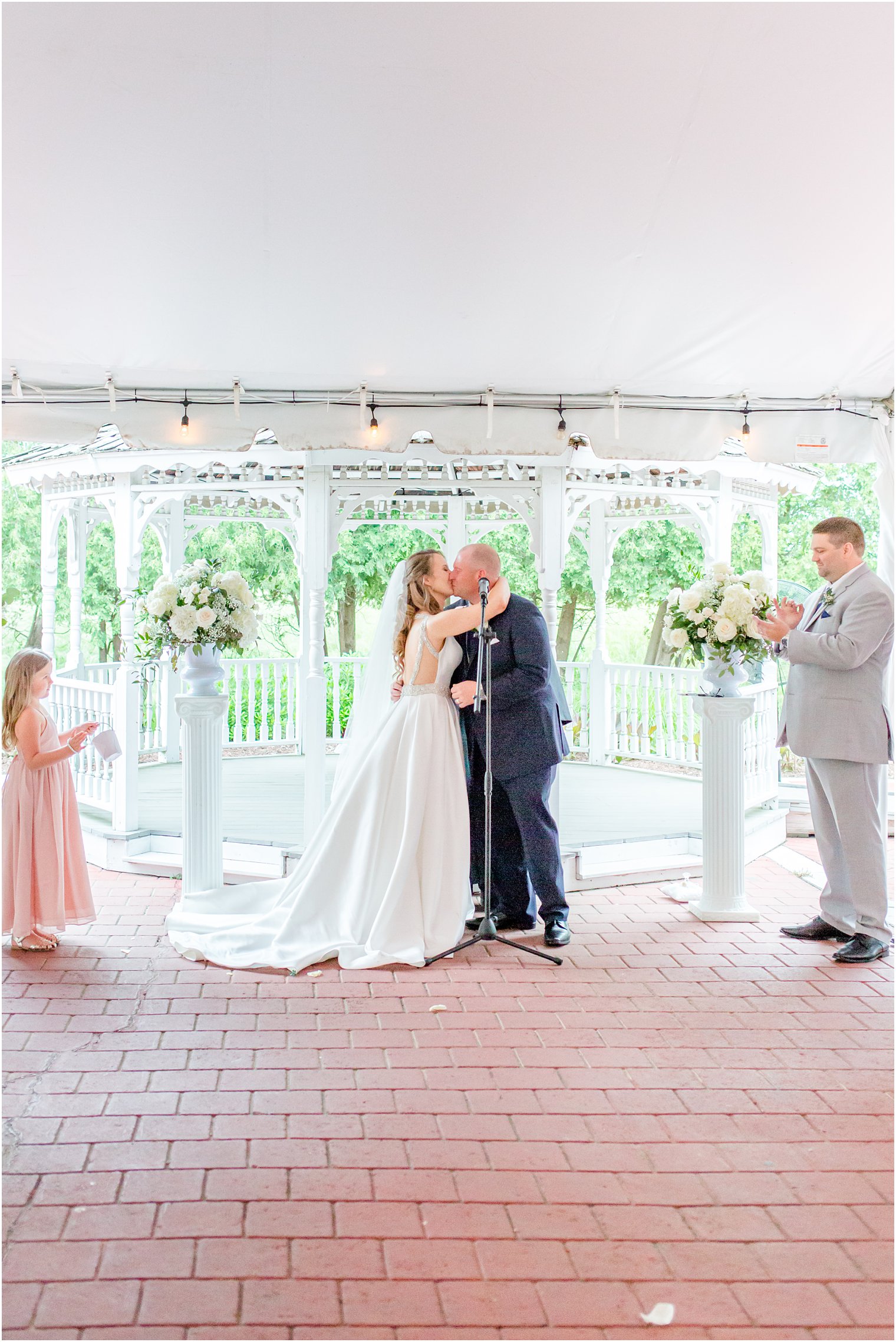 bride and groom kiss after NJ wedding ceremony 