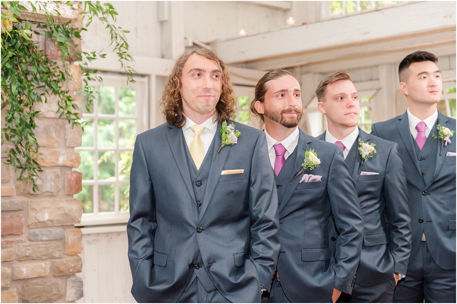 groom smiles watching bride walk down aisle at Ashford Estate