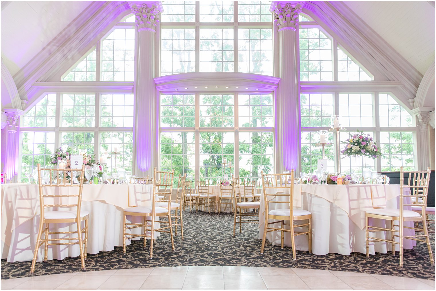 classic ballroom wedding reception at Ashford Estate with purple uplighting 