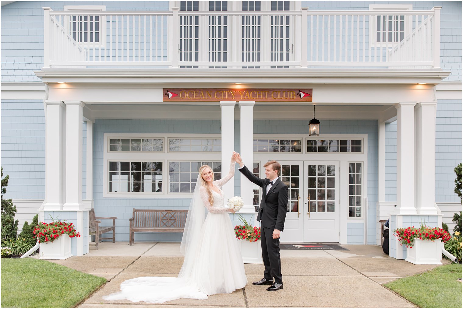 groom twirls bride on rainy wedding day in New Jersey