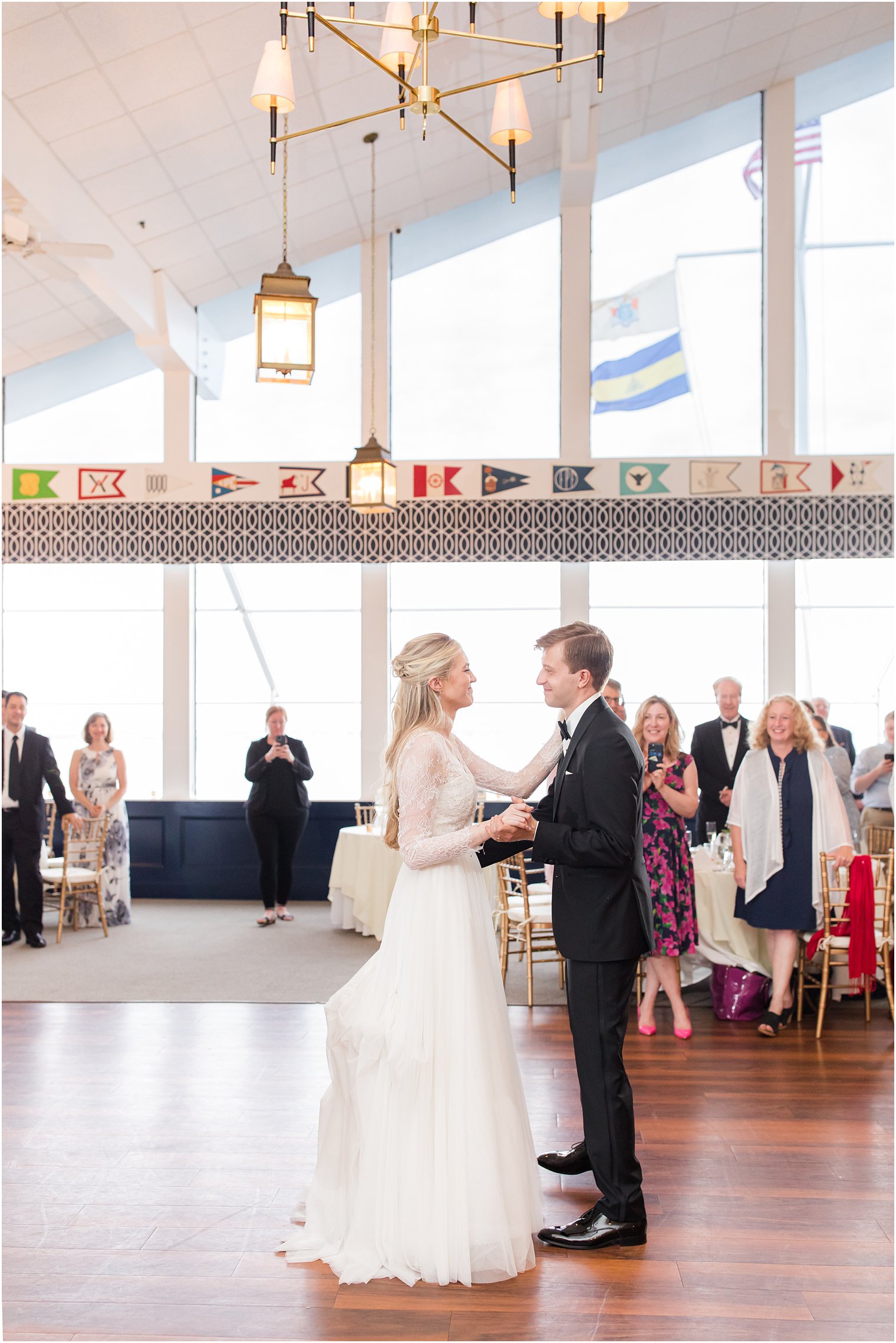 bride and groom have first look during Ocean City Yacht Club wedding reception
