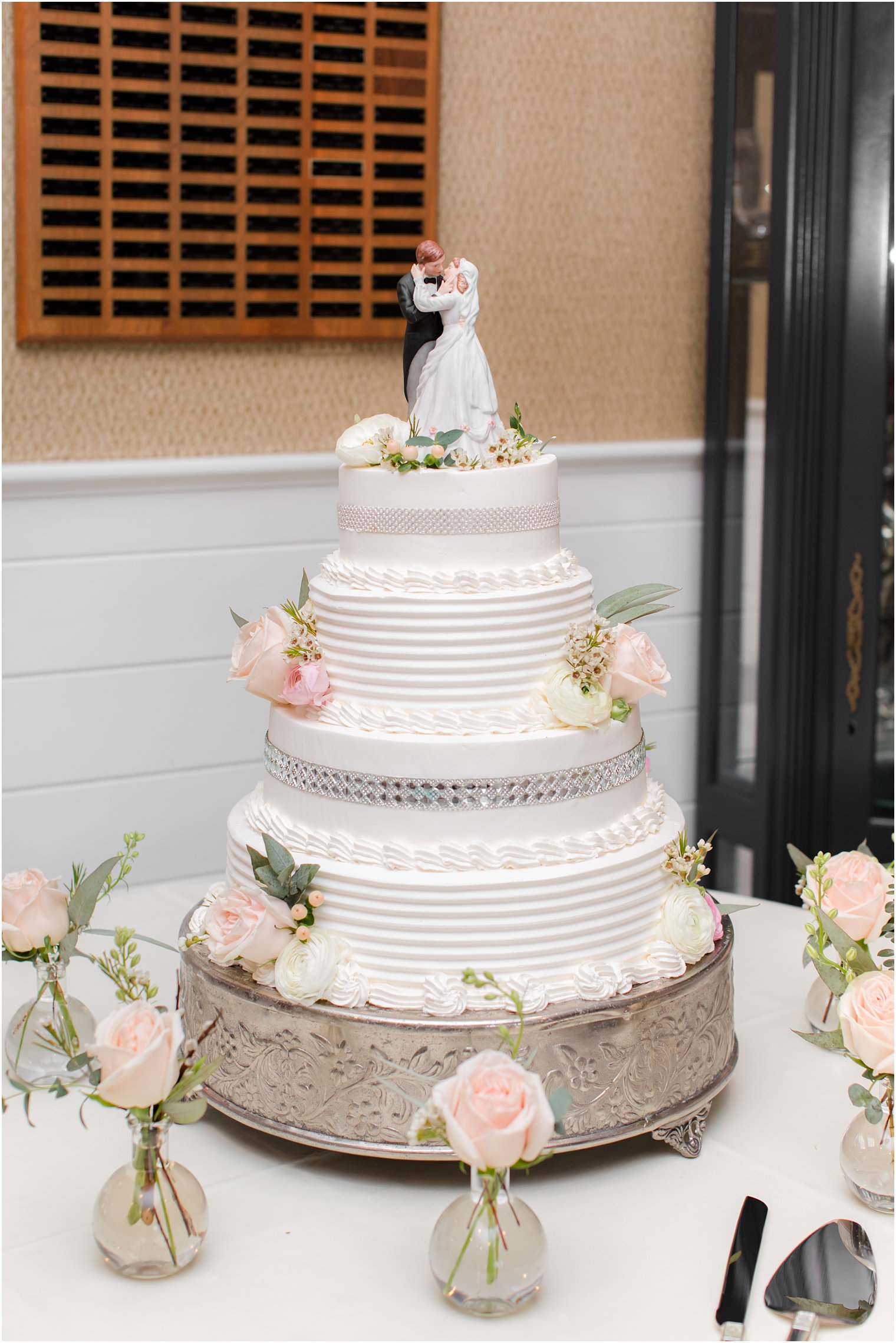 tiered wedding cake with traditional cake topper for NJ wedding reception 