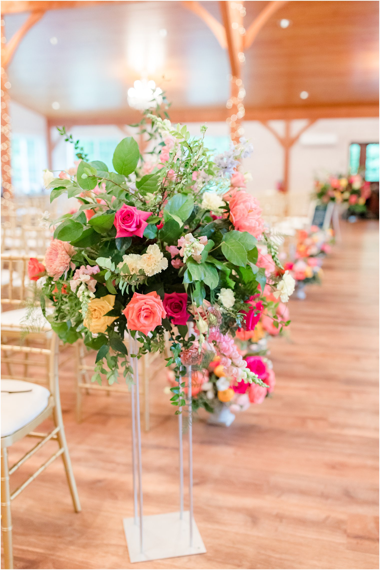 spring floral display inside Rosemont Manor's barn 