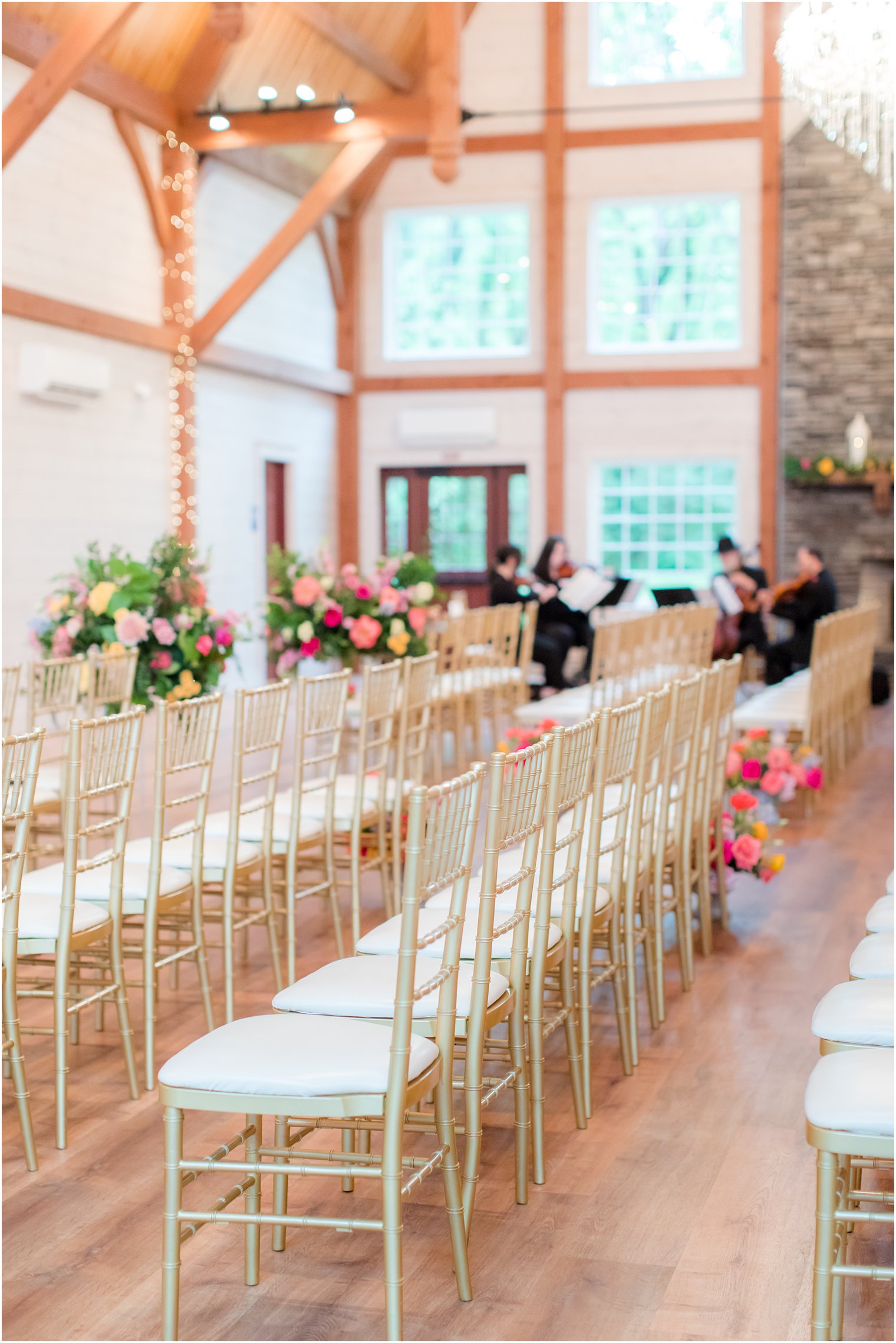 gold chivari chairs and string quartet inside Rosemont Manor