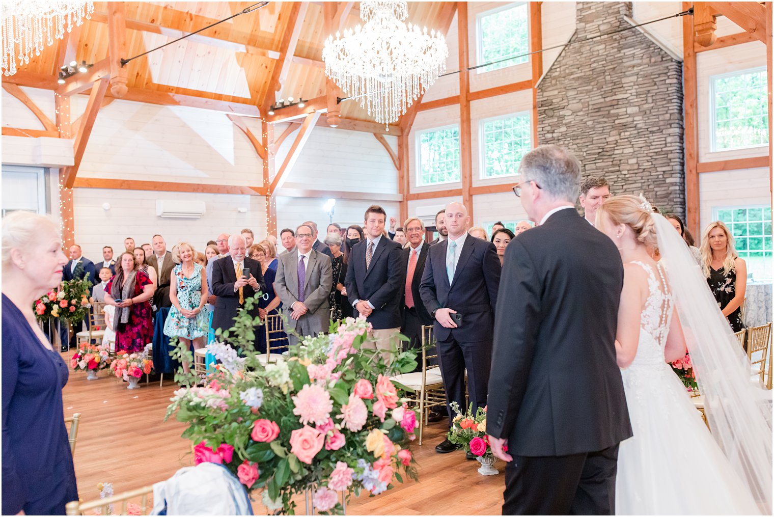 bride walks down aisle with dad during wedding ceremony in Berryville VA