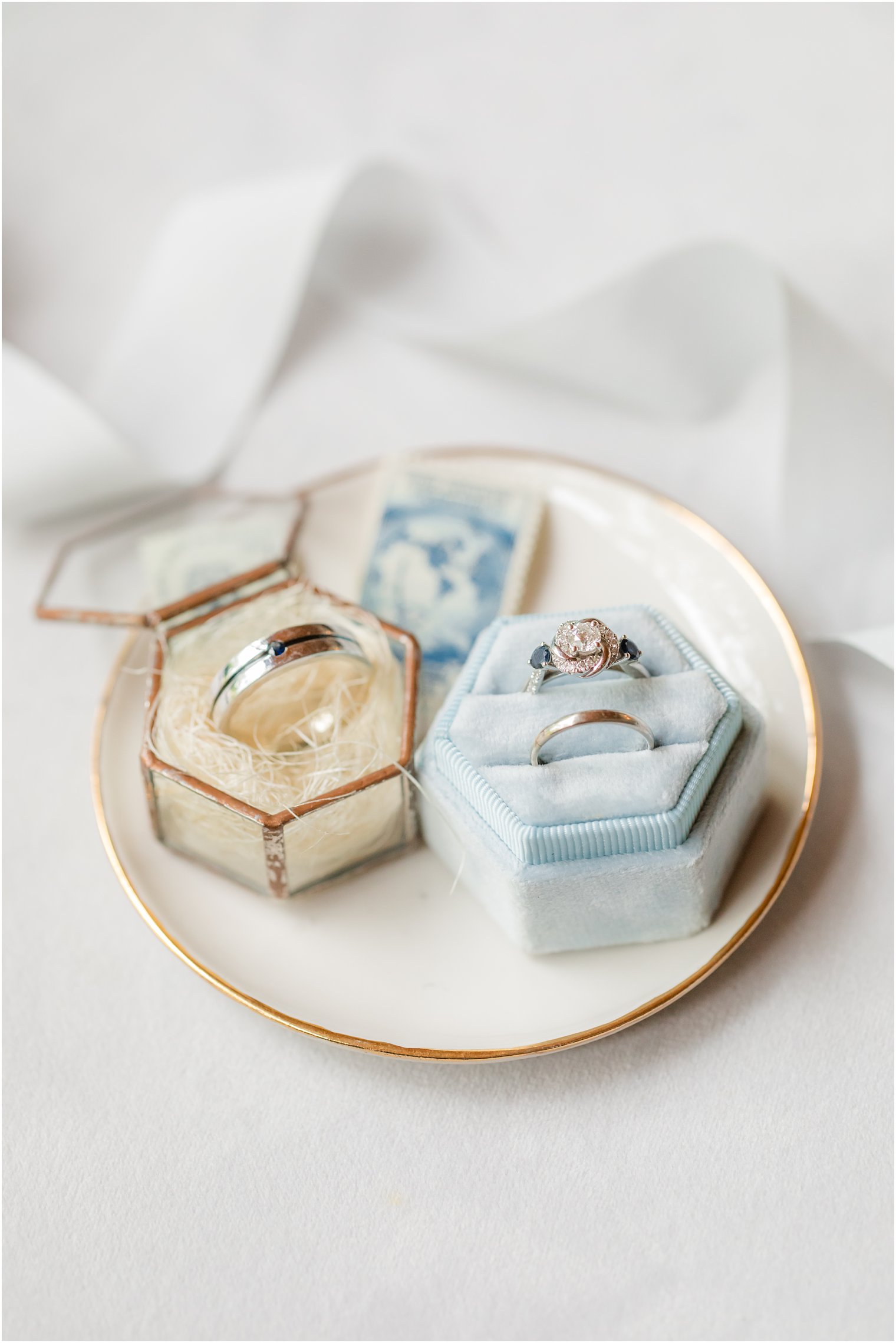 wedding ring rests in pastel blue box before VA wedding