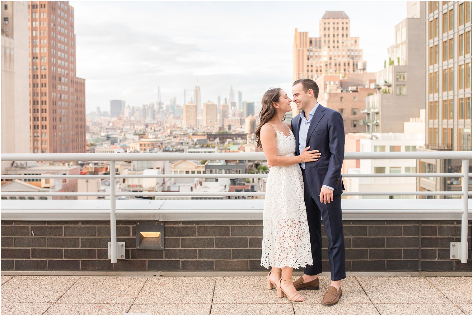 engaged couple on Tribeca apartment building rooftop