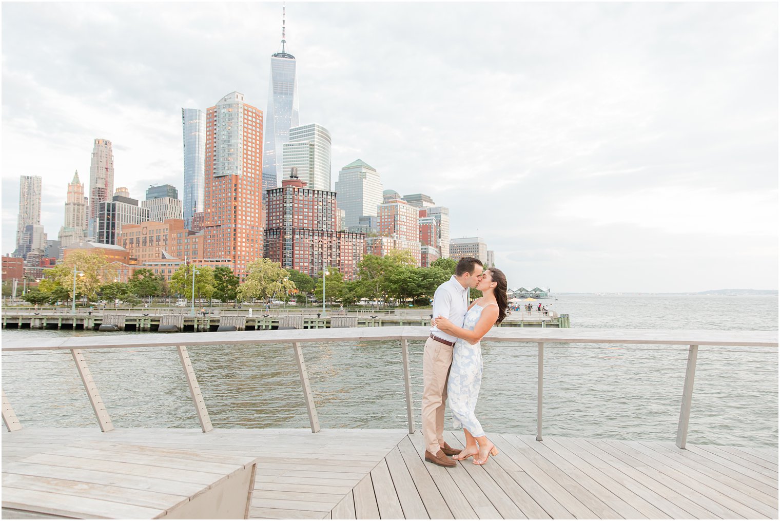 engaged couple kissing on Pier 26 in Tribeca engagement photos