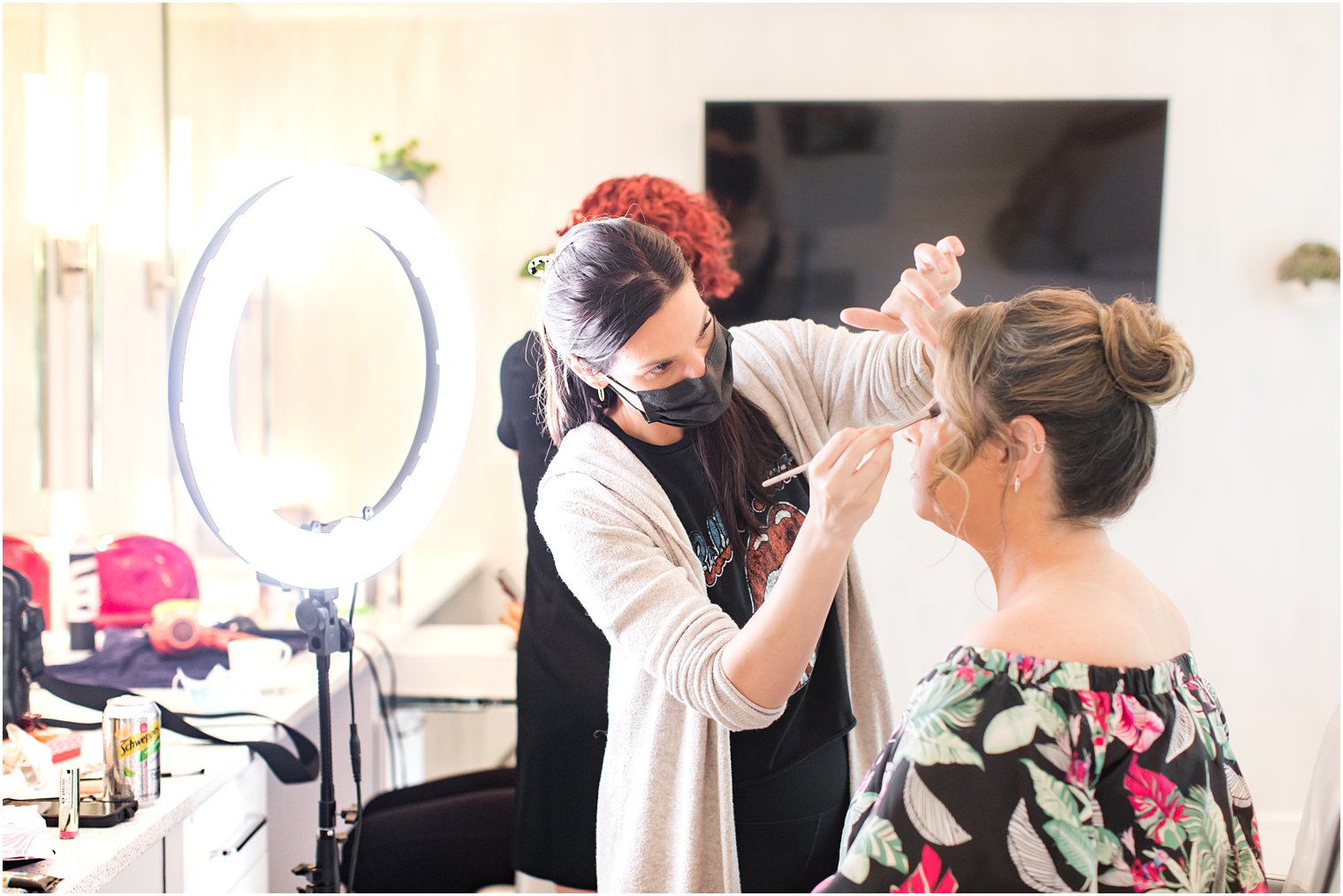 woman getting her hair done by Michelle Renee Beauty