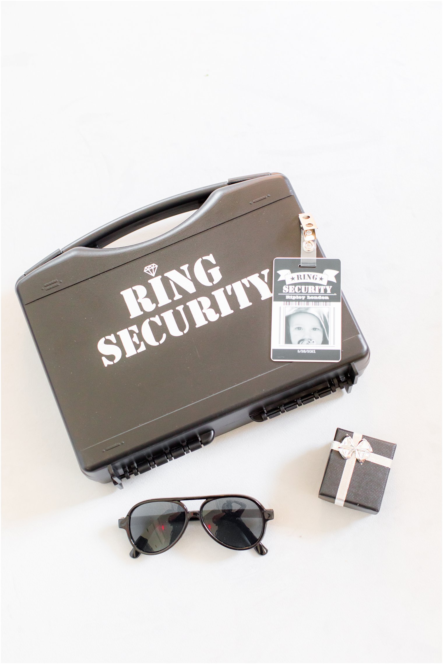 flatlay with Ring Security for wedding bands
