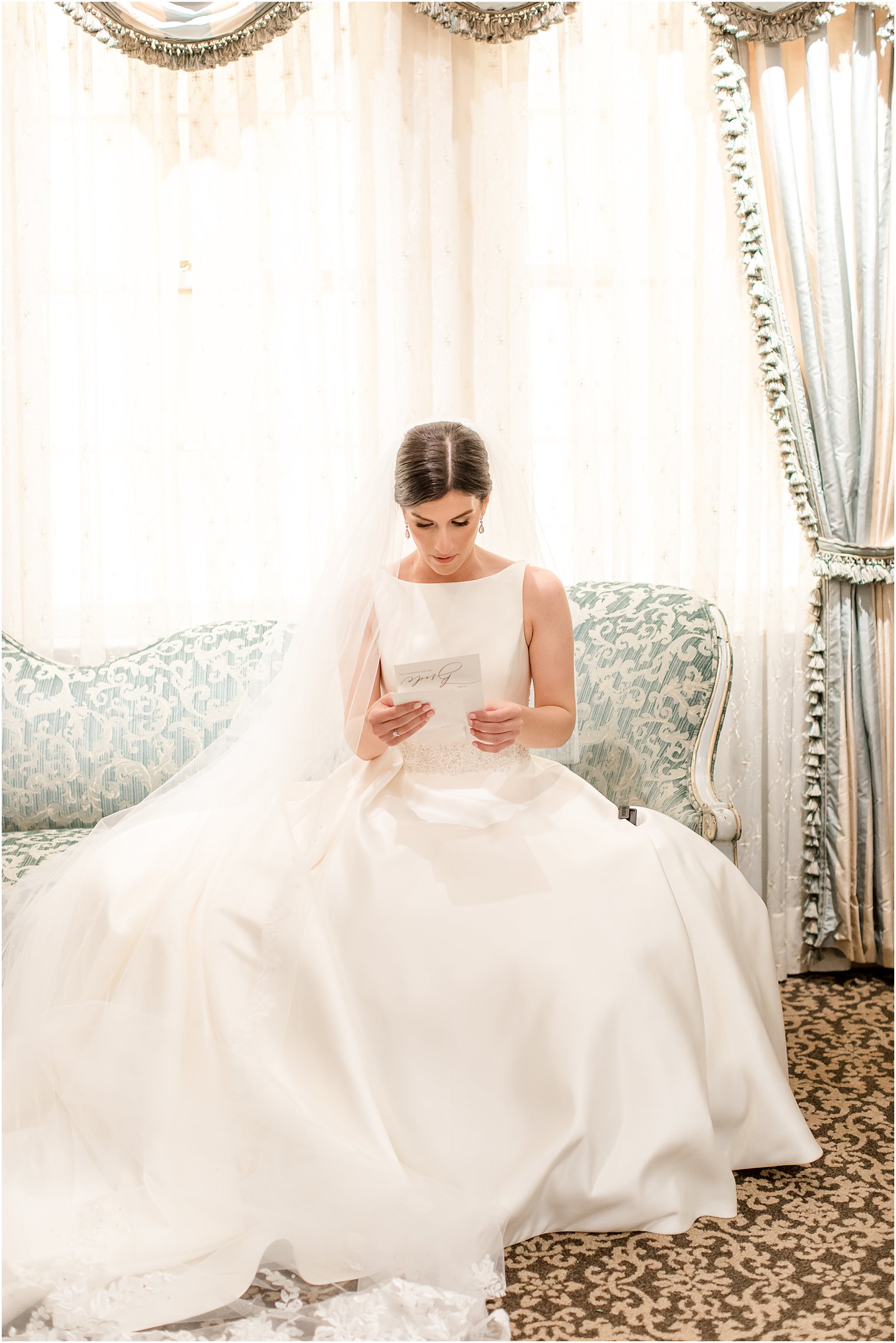 bride reads letter on morning of wedding day