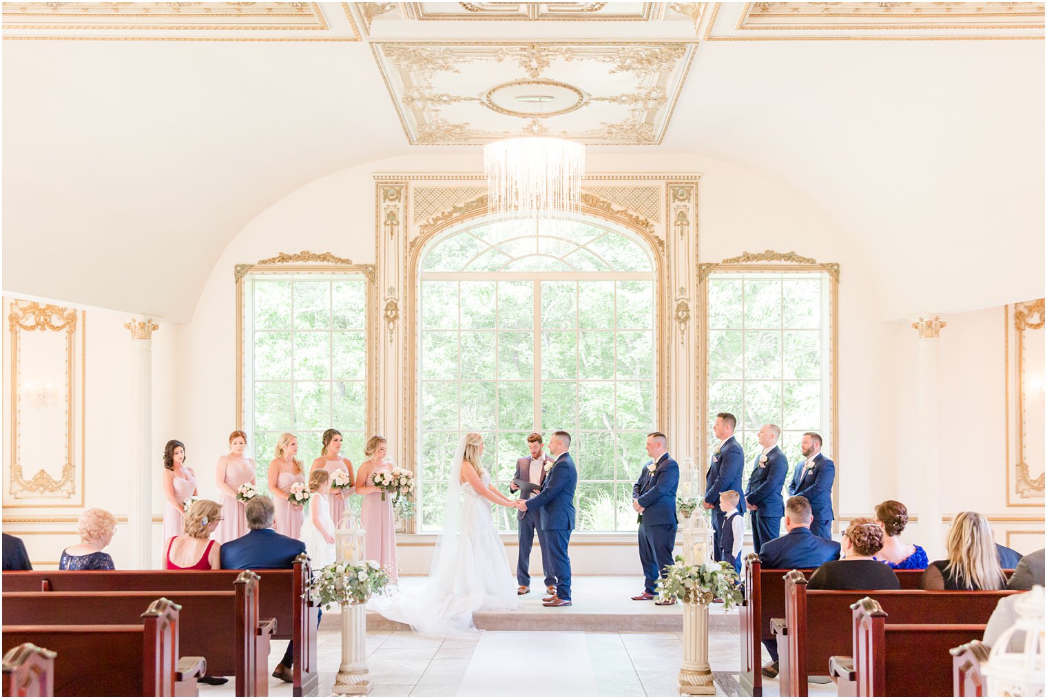 bride and groom hold hands during ceremony in Brigalias chapel 