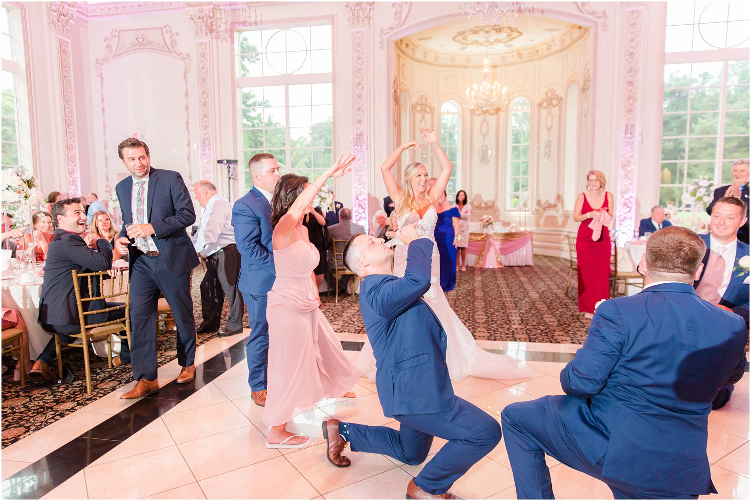 bride dances with wedding party during Brigalias reception 