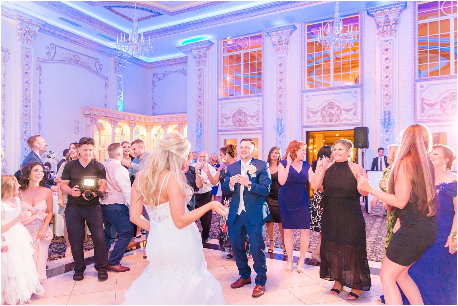 guests dance with bride and groom at NJ wedding reception 