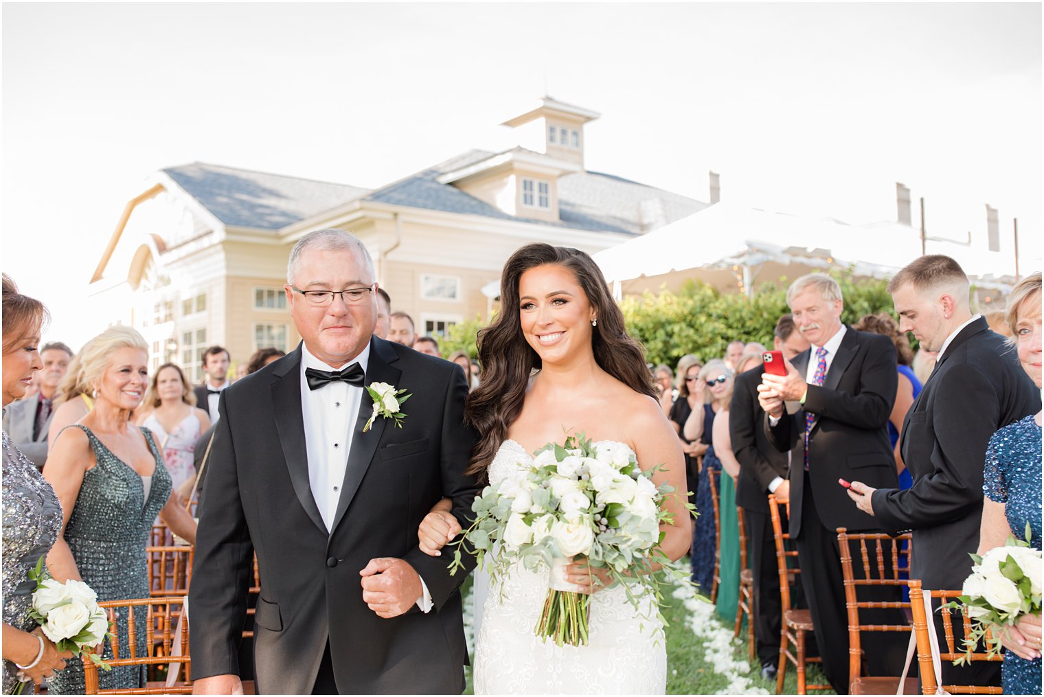bride and father walk down aisle at Navesink Country Club