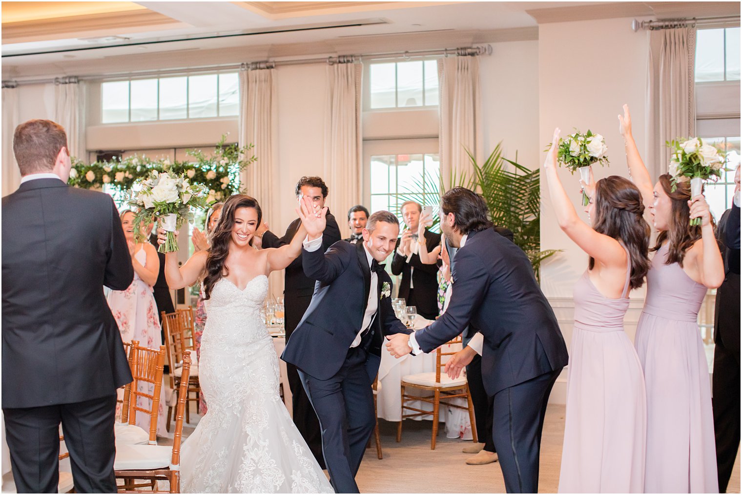 bride and groom dance into wedding reception at Navesink Country Club