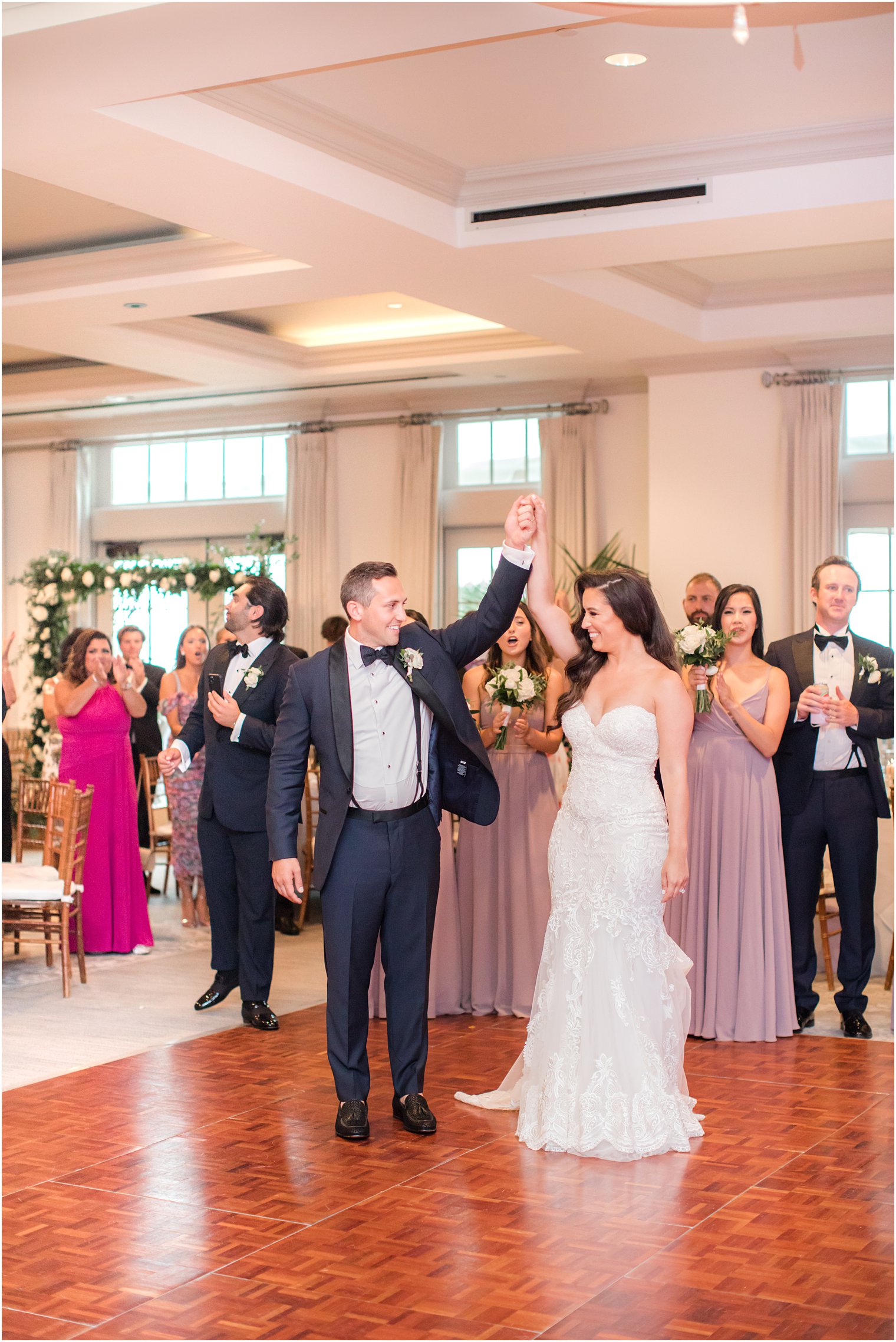 groom introduces bride during NJ wedding reception