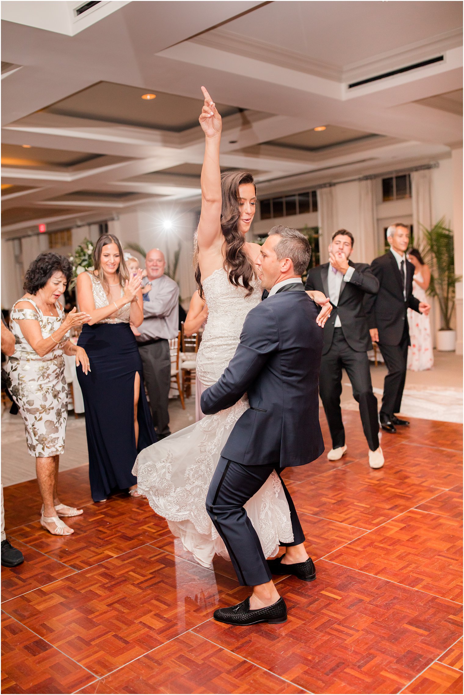 groom lifts bride up during dance at NJ wedding reception