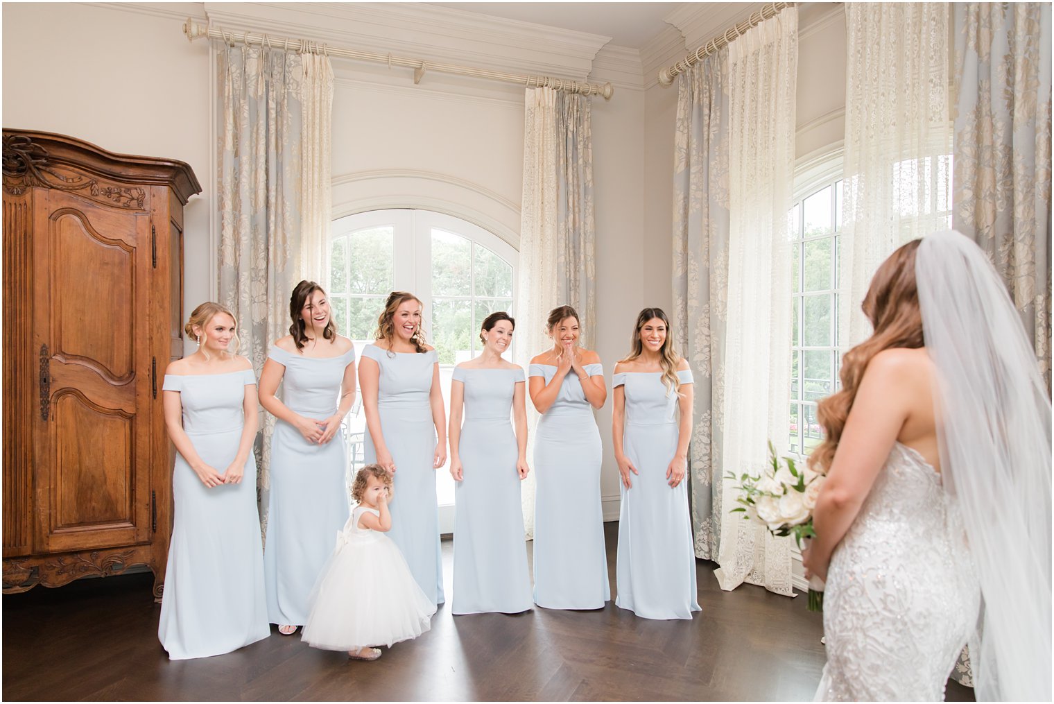 bridesmaids see bride in gown for the first time at Park Chateau Estate