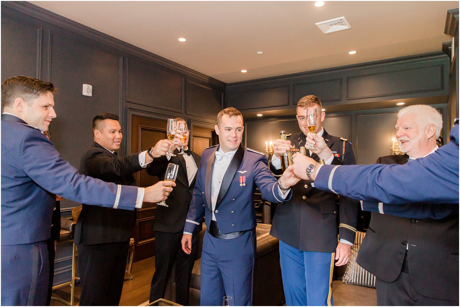 groom and groomsmen toast before Park Chateau Estate wedding day