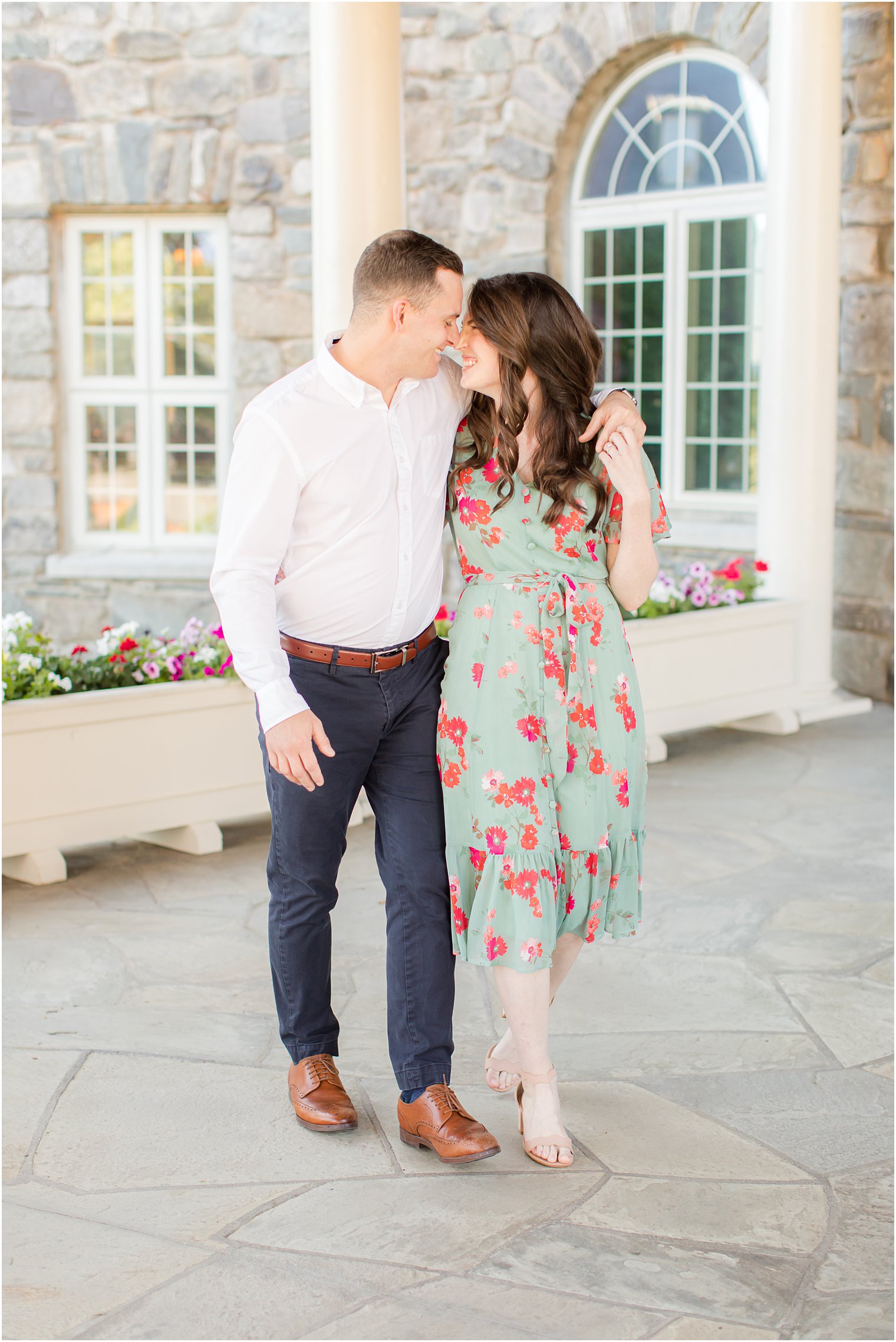 engaged couple nuzzles noses during Skytop Lodge engagement photos