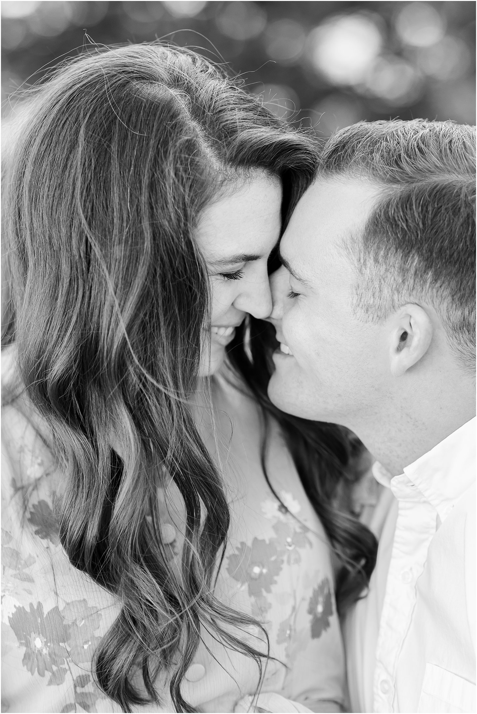 bride and groom nuzzle noses during Skytop Lodge engagement portraits 