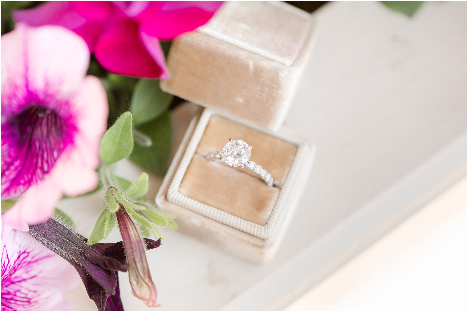 diamond engagement ring in tan box
